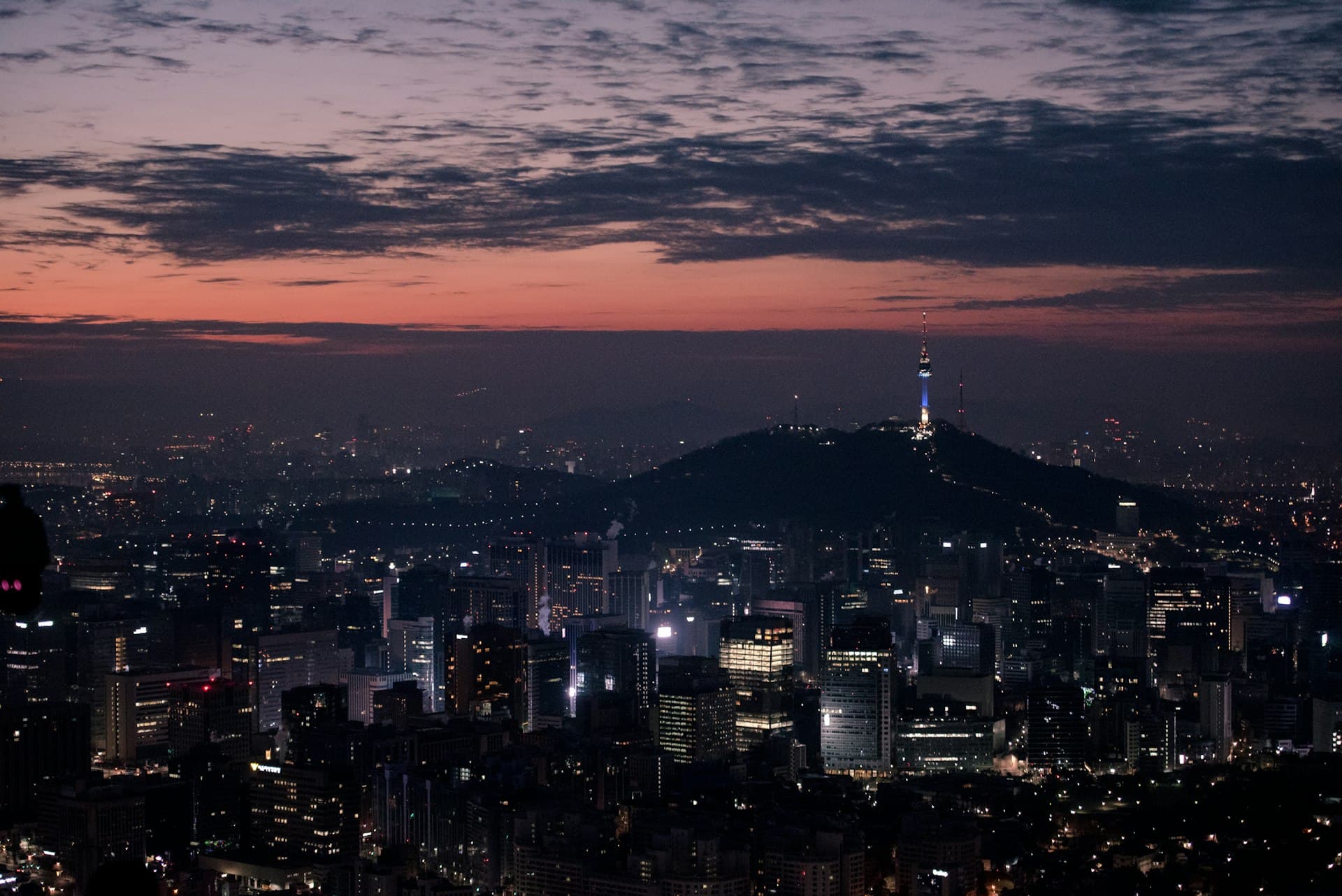 Seoul skyline at night with glittering city lights
